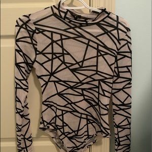 Nude/black printed bodysuit size L. Never worn